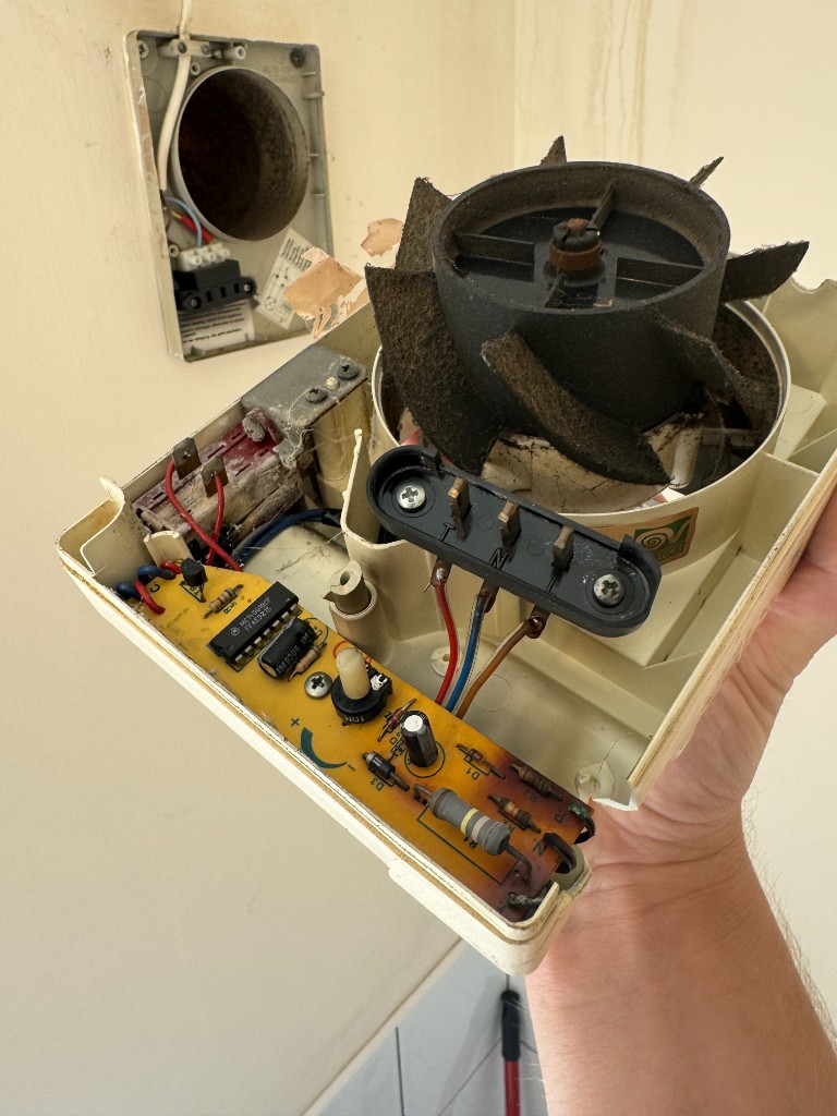 CoverEstate electrician fault-finding on a bathroom extractor fan unit